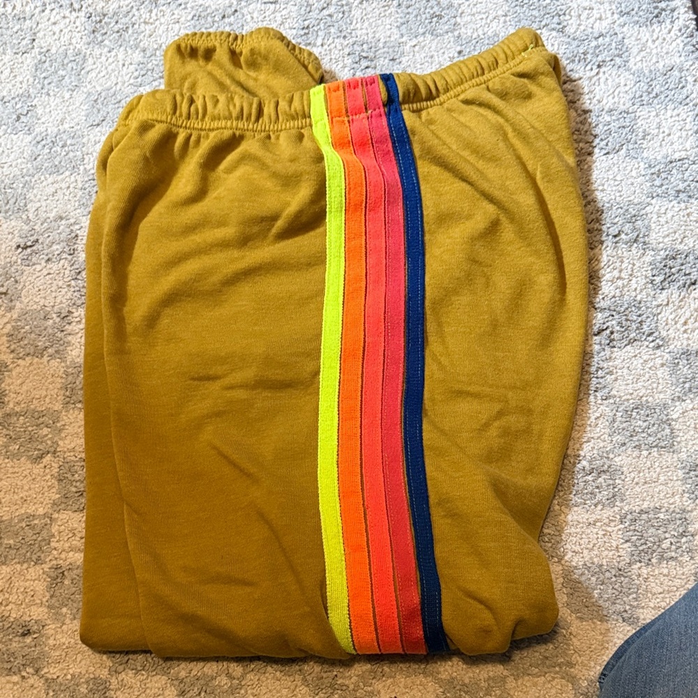 Aviator Nation Mustard Track Pants with Rainbow Stripes